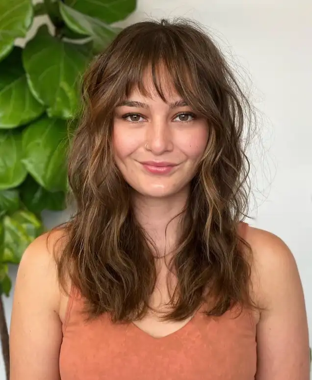 Trendy Wolf Cut with Bangs: The Perfect Modern Hairstyle